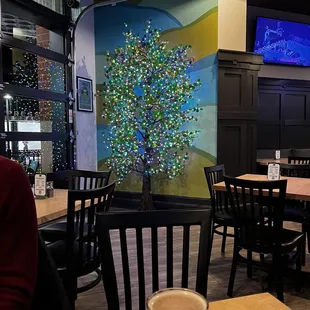 a christmas tree painted on the wall