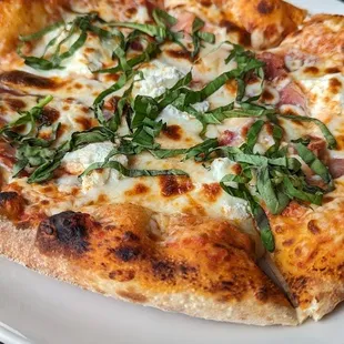 The newest pizza added to the menu is beautiful, just lacks in flavor.