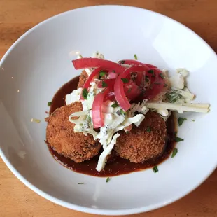 PORK CAKES
Fischer farms pork, apple slaw, smoked mustard BBQ, &amp; pickled red onions