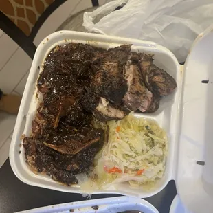 Oxtails/jerk chicken combo