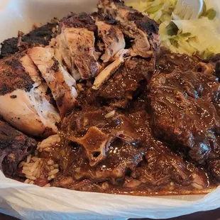 Jerk chicken, cabbage, oxtail and rice and peas