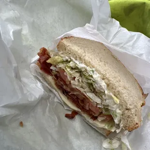 a sandwich on a piece of paper