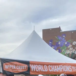 Their awesome booth at Pizza Fest edited due to others being in photo