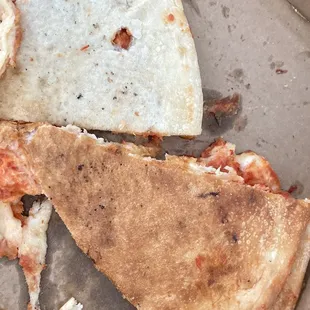 Same pie, only ONE piece was cooked?  Tossed the entire pile of saturated sauces a d cheese in the garbage.