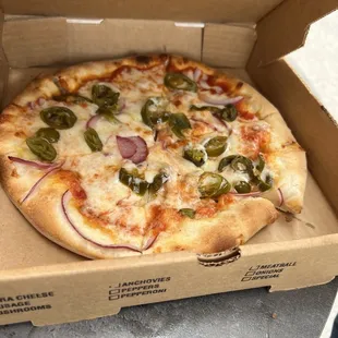 10 inch pizza with jalapeños and onions