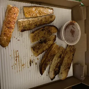 Garlic Bread that essentially looked and tasted like hot dog buns or Costco breadsticks cut in to four pieces each.