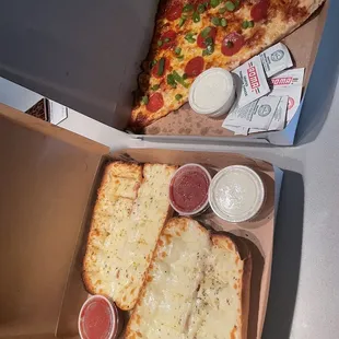 Garlic cheese bread &amp; Pizza By The Slice pepperoni &amp; green peppers