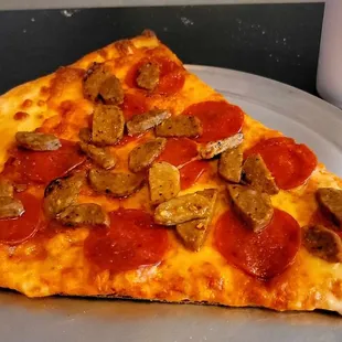 Huge slice and drink for $10.65 (2 toppings).  Sept 2023.  Not bad but not great, either.