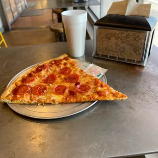 Slice and a soda for $7!