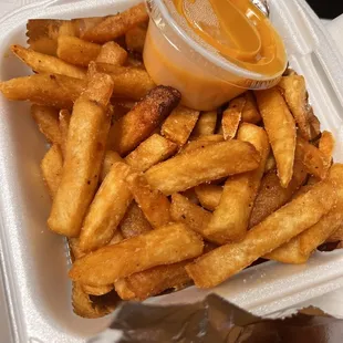 french fries in a styrofoam container