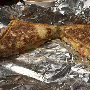 a grilled cheese and tomato sandwich