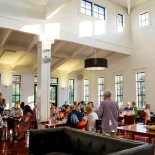 a large dining room full of people