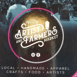 Photo is of a postcard from a market vendor's table.. backside is for a Upcoming Christmas event.