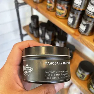 They have travel tin candles