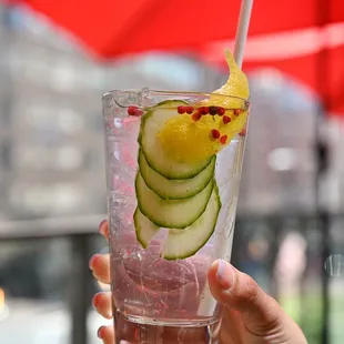 a cucumber drink in a glass
