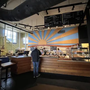 a man standing in front of the counter