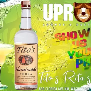 a bottle of vodka and a glass of lemonade