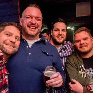 a group of men posing for a picture