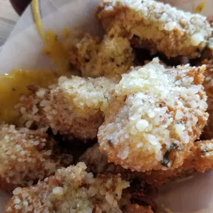 Artichoke heart deep fried with parmesan cheese.