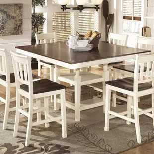 Our best selling new Ashley Gathering Height Dining Table, great two tone cottage look!