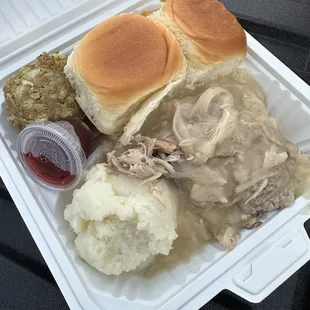 a styrofoam meal in a styrofoam container