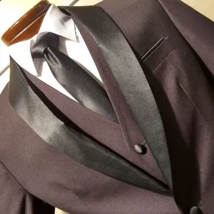 Prom Look, Burgundy three piece Tuxedo with Black Shawl label.$199