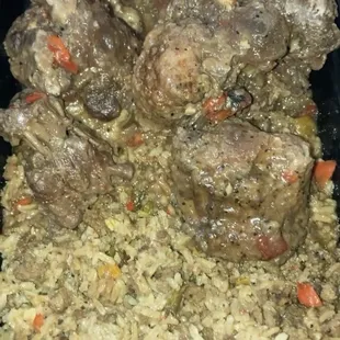 Ox tails w/dirty rice