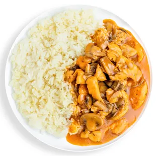 a plate of food with rice and mushrooms