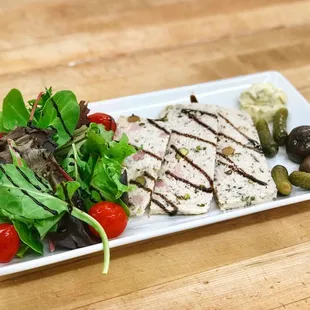 Country-style chicken pistachio pâté, cippolini, peppadew peppers, cornichons, home-made dijon aioli and a balsamic drizzle