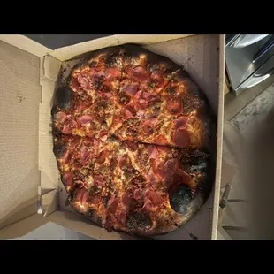 Burnt pizza.