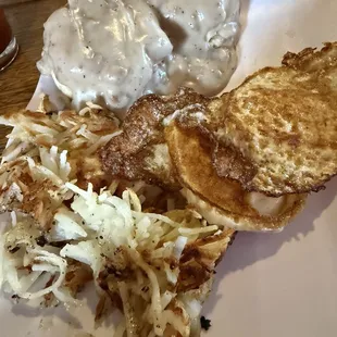 Biscuits and gravy with fried eggs and hashbrowns!