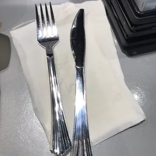 Umm plastic fork &amp; knife instead of real silverware at the &quot;uptown?&quot; Ok.