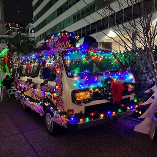 a decorated truck with christmas lights