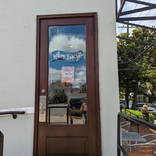 Front door is at the back of the building