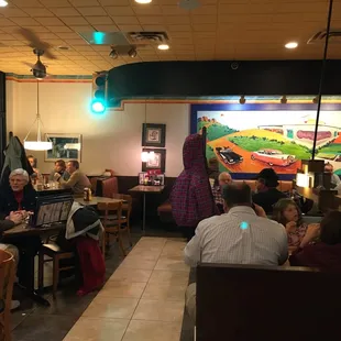 Check out the '50s mural on the back wall