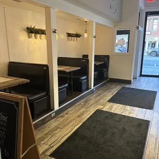 Front room booths across from deli case.