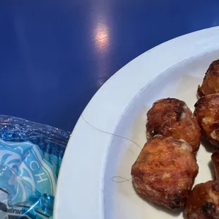Waitress&apos; hair on left side of platter.