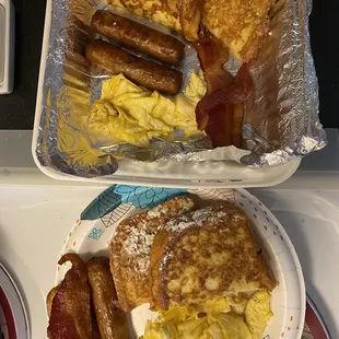 French Toast, scrambled eggs and bacon with thick sausage
