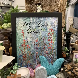 Local artwork. Let Love Grow is made with eggshells!