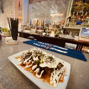 a plate of nachos