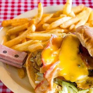 a cheeseburger and fries on a plate