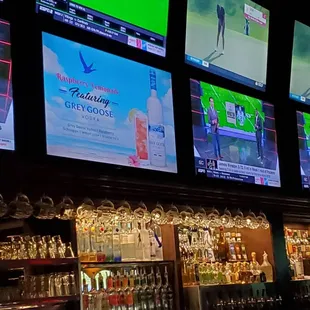 Many screens in this Sports Bar and one screen with Alcohol information.  9/15/2021