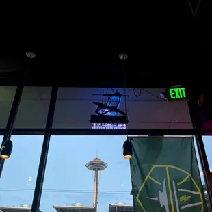 Space Needle view from the bar seating area inside.