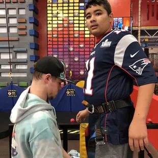 Getting ready to tackle the rock climbing wall.