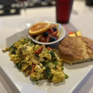 Tofu scramble with fruit and biscuit (not vegan)