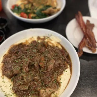 Oxtail &amp; Grits, Cat Fish &amp; Grits, and a side of bacon.