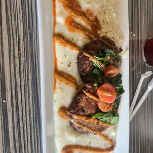 Salmon croquette and grits