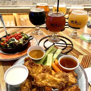 Beer battered chicken fingers, brussels sprouts and 1/6 cup tasting.