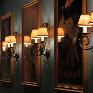 a row of lamps on a wall