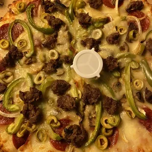 Supreme pizza lunch special. With two sodas included.